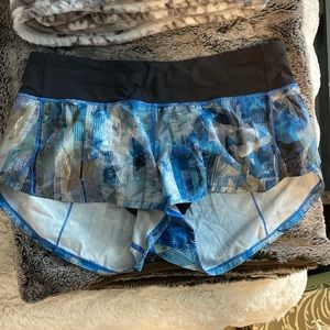 Blue patterned Lululemon shorts speed up